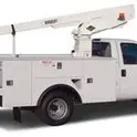 White bucket truck with arm lowered