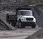 White and Black Freightliner Dump Truck