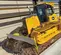 Yellow John Deere 110 HP bulldozer