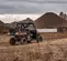 Brown Polaris Pro 4-seater UTV