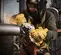 Yellow DeWalt electric angle grinder
