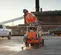 Orange Husqvarna 24 inch Self-propelled Concrete Street Saw