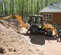 Orange and gray CASE 60-90 HP Backhoe Loader, 14 ft. Dig Depth