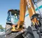 Orange and gray Case Backhoe Loader with 15 foot Dig Depth