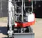 Red, white and gray TAKEUCHI 3,000-3,999 lb. Mini Excavator, Zero Tail Swing