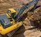 Yellow and gray JOHN DEERE 29,000-38,000 lb. Excavator