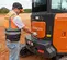 Orange, gray and black HITACHI 7,000-10,000 lb. Mini Excavator, Zero Tail Swing