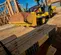 Yellow and black John Deere landscape loader