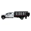White Ford Crew Cab Stake Bed Truck