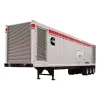 White, black and silver CUMMINS 1,600-2,000 kW Towable Generator, Diesel
