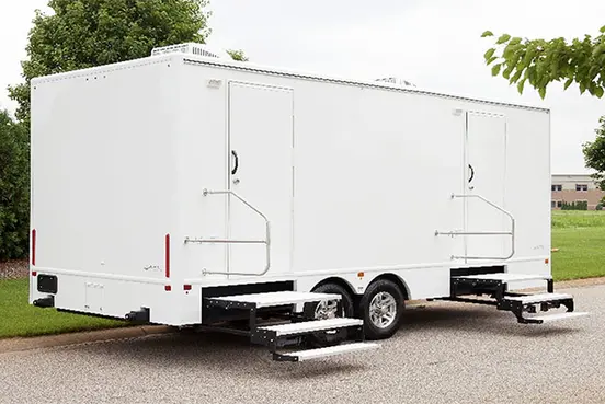 ROS 8-Station white Restroom Trailer exterior photograph